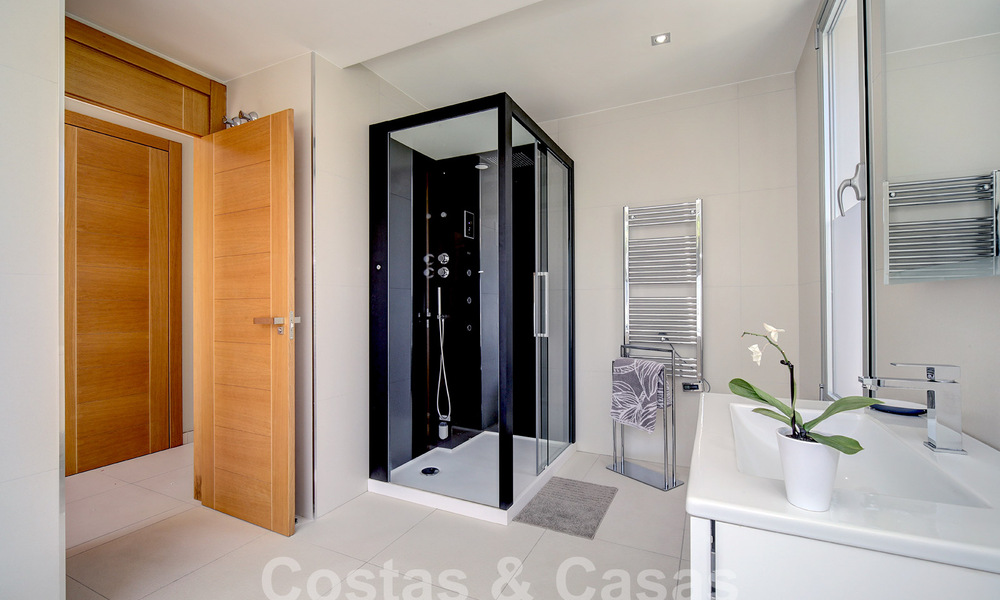 Modern luxury villa for sale looking at the golf in Nueva Andalucia, Marbella 60781