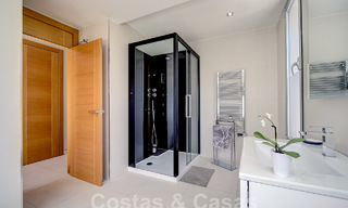 Modern luxury villa for sale looking at the golf in Nueva Andalucia, Marbella 60781 