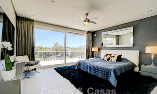 Modern luxury villa for sale looking at the golf in Nueva Andalucia, Marbella 60786 