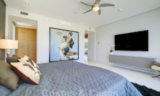 Modern luxury villa for sale looking at the golf in Nueva Andalucia, Marbella 60789 