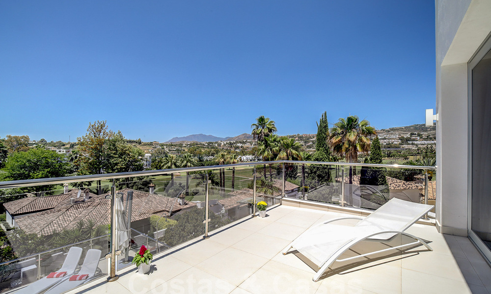 Modern luxury villa for sale looking at the golf in Nueva Andalucia, Marbella 60795