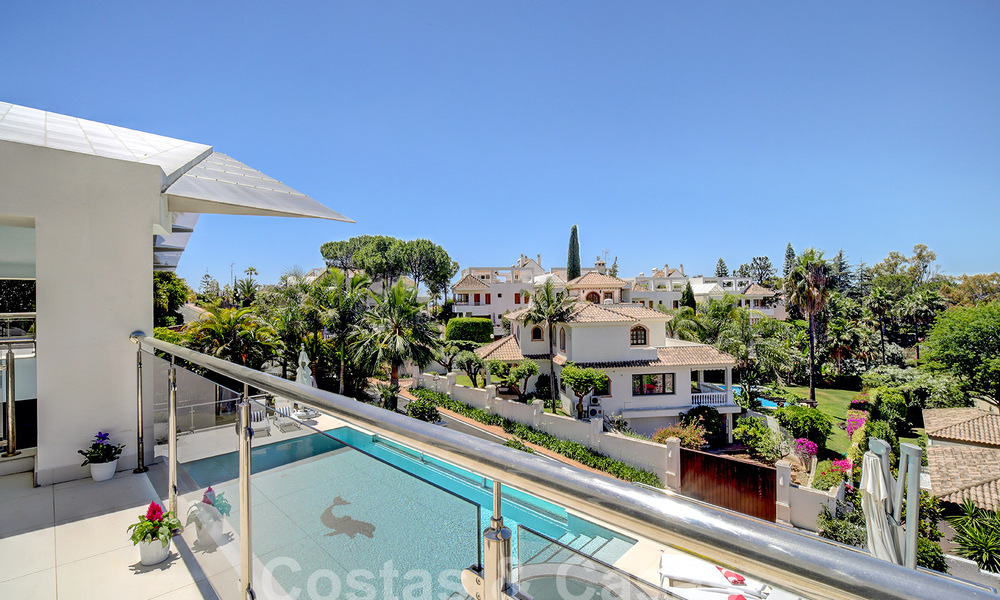 Modern luxury villa for sale looking at the golf in Nueva Andalucia, Marbella 60797