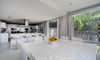 Modern luxury villa for sale looking at the golf in Nueva Andalucia, Marbella 60803 