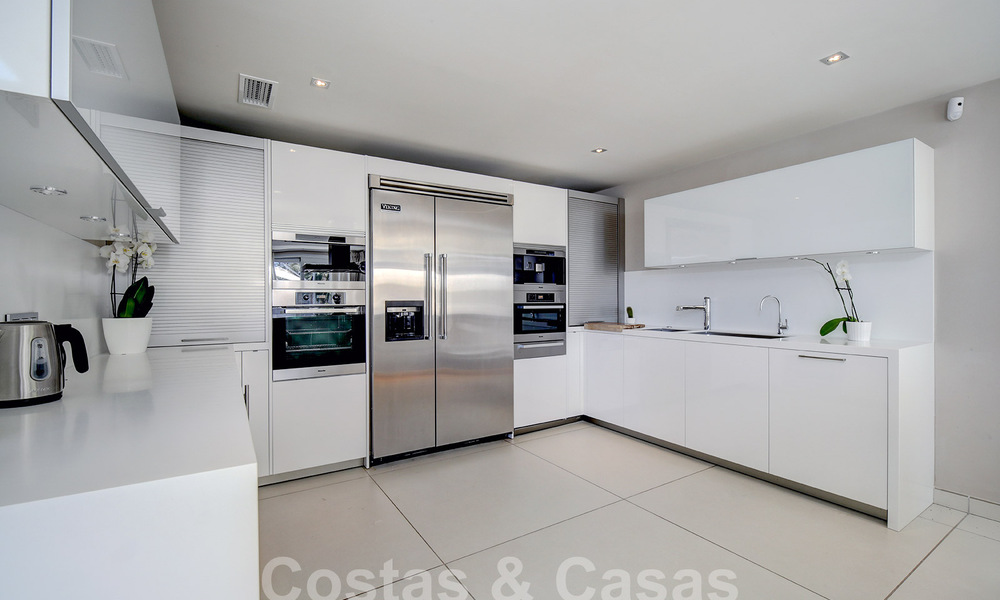 Modern luxury villa for sale looking at the golf in Nueva Andalucia, Marbella 60804