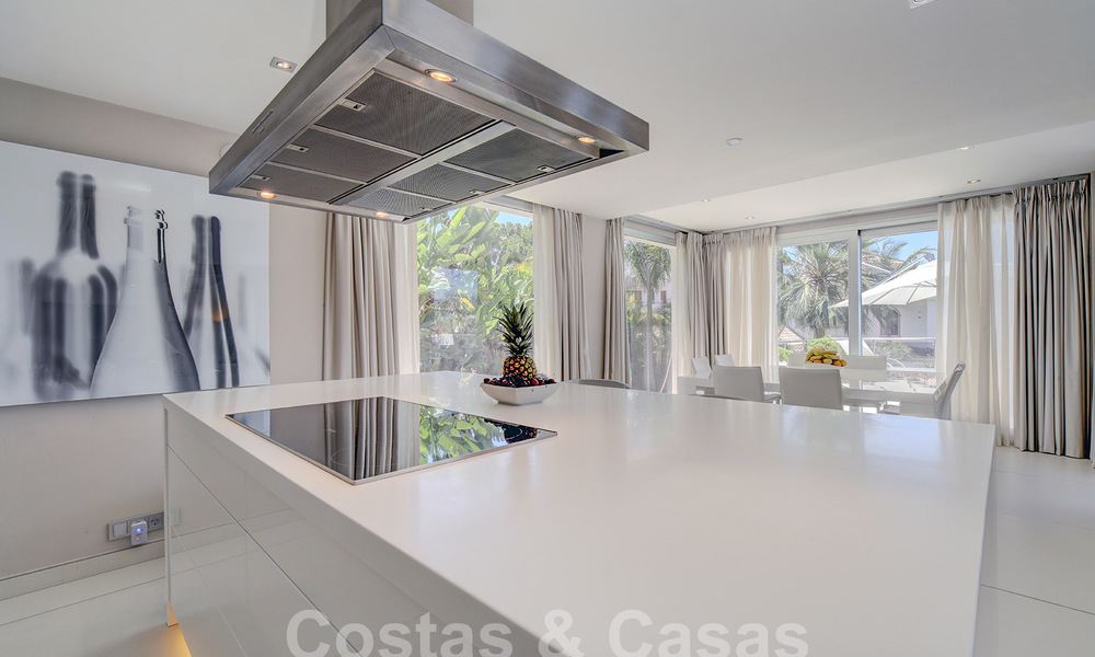 Modern luxury villa for sale looking at the golf in Nueva Andalucia, Marbella 60805