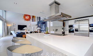 Modern luxury villa for sale looking at the golf in Nueva Andalucia, Marbella 60806 