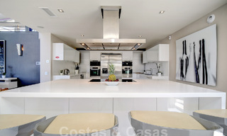 Modern luxury villa for sale looking at the golf in Nueva Andalucia, Marbella 60807 