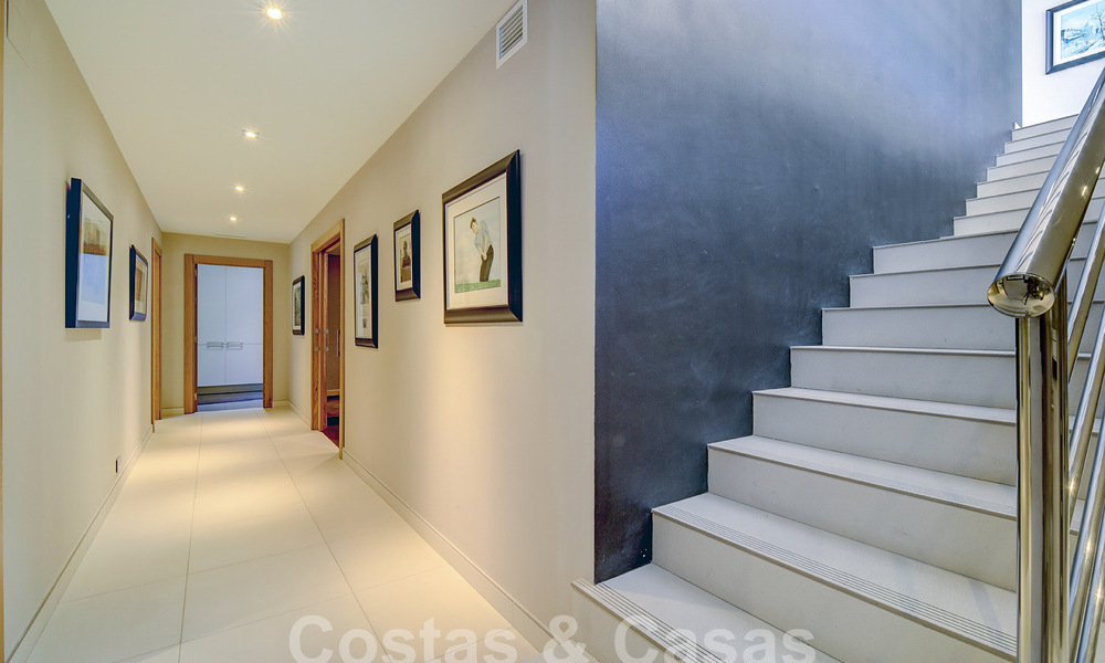 Modern luxury villa for sale looking at the golf in Nueva Andalucia, Marbella 60816