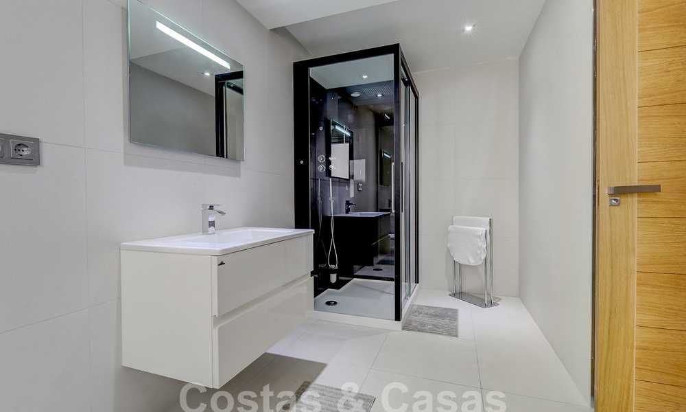 Modern luxury villa for sale looking at the golf in Nueva Andalucia, Marbella 60817