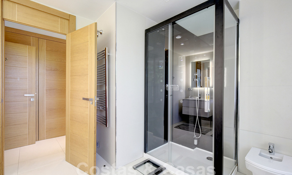 Modern luxury villa for sale looking at the golf in Nueva Andalucia, Marbella 60825