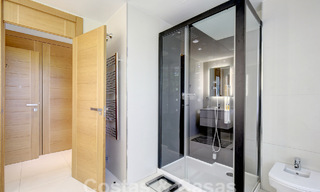 Modern luxury villa for sale looking at the golf in Nueva Andalucia, Marbella 60825 