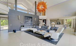 Modern luxury villa for sale looking at the golf in Nueva Andalucia, Marbella 60828 