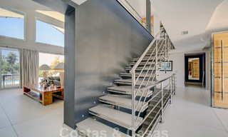Modern luxury villa for sale looking at the golf in Nueva Andalucia, Marbella 60833 