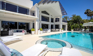 Modern luxury villa for sale looking at the golf in Nueva Andalucia, Marbella 60835 