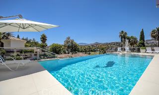 Modern luxury villa for sale looking at the golf in Nueva Andalucia, Marbella 60836 