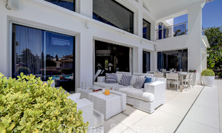 Modern luxury villa for sale looking at the golf in Nueva Andalucia, Marbella 60839 