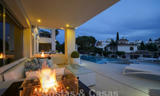 Modern luxury villa for sale looking at the golf in Nueva Andalucia, Marbella 60842 