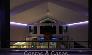 Modern luxury villa for sale looking at the golf in Nueva Andalucia, Marbella 60847 