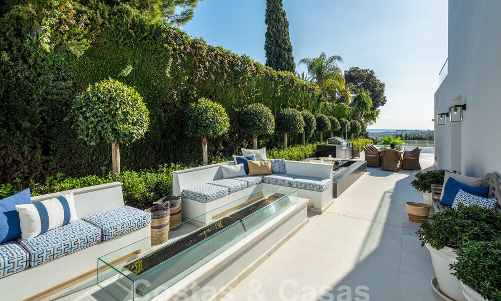 Spectacular resort-style luxury villa for sale with sea views in Nueva Andalucia's golf valley, Marbella 61085