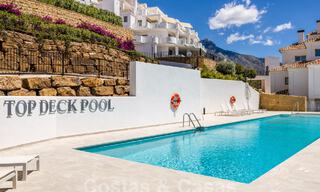 Sophisticated, spacious, luxury penthouse for sale with sea views in a boutique complex in Nueva Andalucia, Marbella 61208 