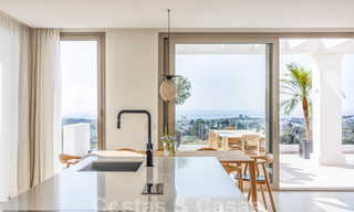 Sophisticated, spacious, luxury penthouse for sale with sea views in a boutique complex in Nueva Andalucia, Marbella 61217 