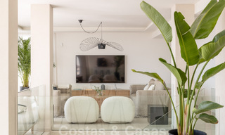 Sophisticated, spacious, luxury penthouse for sale with sea views in a boutique complex in Nueva Andalucia, Marbella 61219 