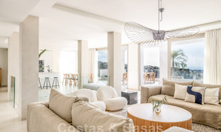 Sophisticated, spacious, luxury penthouse for sale with sea views in a boutique complex in Nueva Andalucia, Marbella 61221 