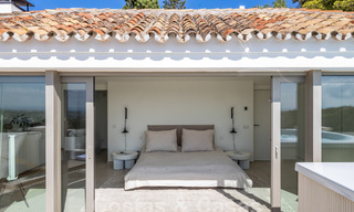 Sophisticated, spacious, luxury penthouse for sale with sea views in a boutique complex in Nueva Andalucia, Marbella 61243 