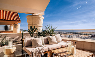 Impressive renovated penthouse for sale with panoramic golf and sea views in the heart of Nueva Andalucia, Marbella 61804 