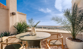 Impressive renovated penthouse for sale with panoramic golf and sea views in the heart of Nueva Andalucia, Marbella 61806 