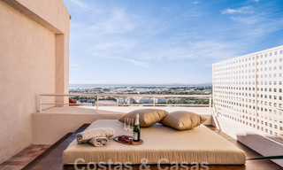 Impressive renovated penthouse for sale with panoramic golf and sea views in the heart of Nueva Andalucia, Marbella 61820 