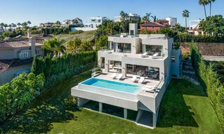 Sophisticated luxury villa with modern design for sale within walking distance of the golf course in Nueva Andalucia, Marbella 61343 