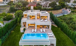 Sophisticated luxury villa with modern design for sale within walking distance of the golf course in Nueva Andalucia, Marbella 61345 