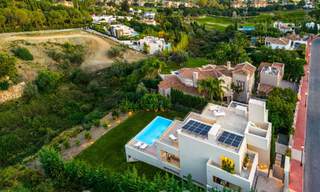 Sophisticated luxury villa with modern design for sale within walking distance of the golf course in Nueva Andalucia, Marbella 61346 