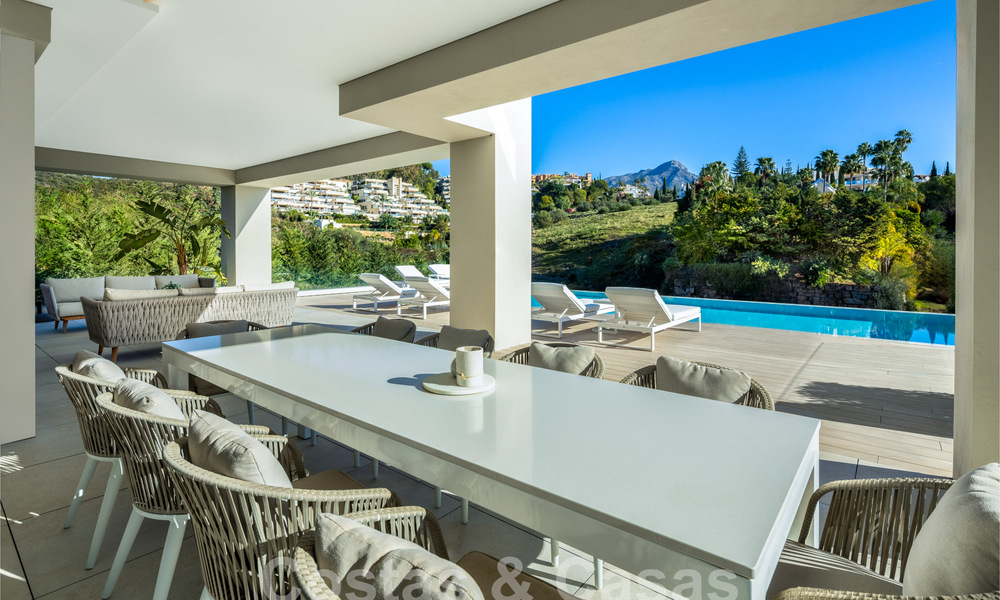 Sophisticated luxury villa with modern design for sale within walking distance of the golf course in Nueva Andalucia, Marbella 61347