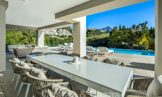 Sophisticated luxury villa with modern design for sale within walking distance of the golf course in Nueva Andalucia, Marbella 61347 