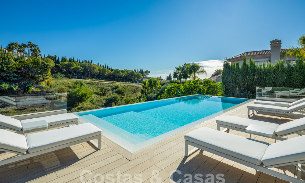 Sophisticated luxury villa with modern design for sale within walking distance of the golf course in Nueva Andalucia, Marbella 61348