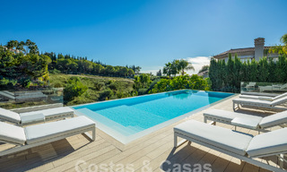 Sophisticated luxury villa with modern design for sale within walking distance of the golf course in Nueva Andalucia, Marbella 61348 