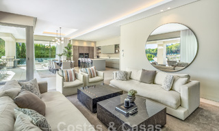 Sophisticated luxury villa with modern design for sale within walking distance of the golf course in Nueva Andalucia, Marbella 61350 