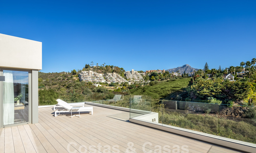 Sophisticated luxury villa with modern design for sale within walking distance of the golf course in Nueva Andalucia, Marbella 61357
