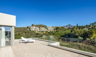 Sophisticated luxury villa with modern design for sale within walking distance of the golf course in Nueva Andalucia, Marbella 61357 