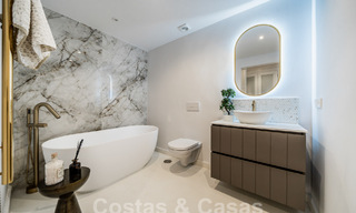 Move-in ready! Charming renovated garden apartment for sale in gated community in La Quinta, Benahavis - Marbella 62197 
