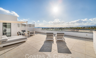 Move-in ready! Modern, luxurious penthouse for sale bordering the golf course, with sea and golf views, East Marbella 62261 