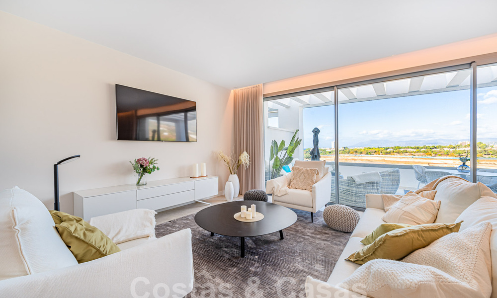 Move-in ready! Modern, luxurious penthouse for sale bordering the golf course, with sea and golf views, East Marbella 62288