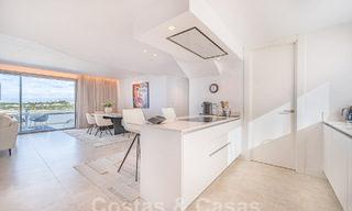 Move-in ready! Modern, luxurious penthouse for sale bordering the golf course, with sea and golf views, East Marbella 62292 