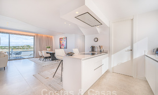 Move-in ready! Modern, luxurious penthouse for sale bordering the golf course, with sea and golf views, East Marbella 62292 