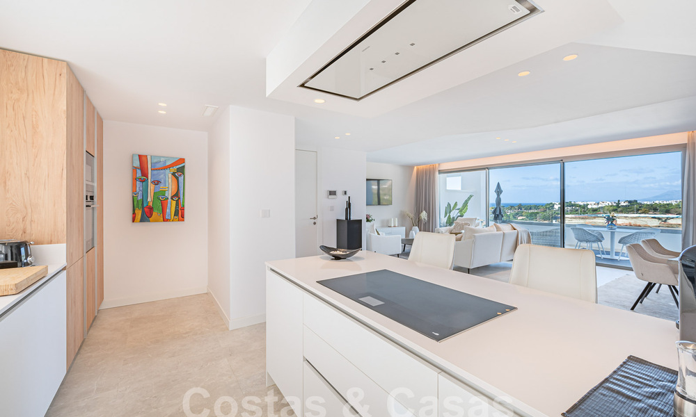 Move-in ready! Modern, luxurious penthouse for sale bordering the golf course, with sea and golf views, East Marbella 62294