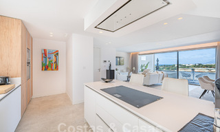 Move-in ready! Modern, luxurious penthouse for sale bordering the golf course, with sea and golf views, East Marbella 62294 