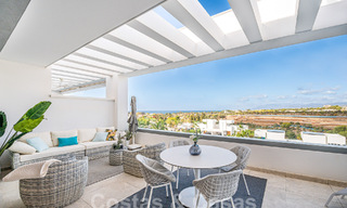 Move-in ready! Modern, luxurious penthouse for sale bordering the golf course, with sea and golf views, East Marbella 62300 