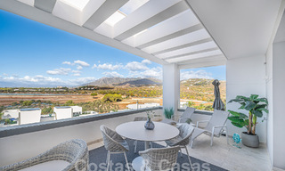 Move-in ready! Modern, luxurious penthouse for sale bordering the golf course, with sea and golf views, East Marbella 62306 